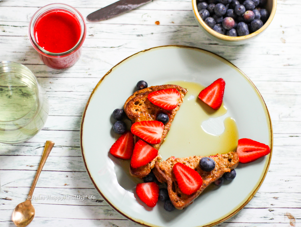 Gluten Free, Vegan Strawberry Filled French Toast Served with Fruit and Maple Syrup